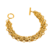 Bracelet chaîne femme doré multi-rangs avec fermoir T-Bar, bijou haut de gamme au design contemporain présenté sur un fond beige élégant.