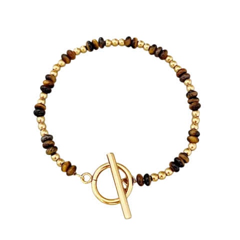 Bracelet femme en acier inoxydable doré avec petites perles dorées, perles effet pierre brunes et fermoir toggle circulaire.