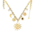 Collier femme doré en acier inoxydable avec chaîne à maillons et breloques célestes comprenant un grand soleil central, une lune, des soleils décoratifs et des perles blanches.
