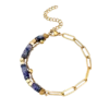 Bracelet en acier inoxydable doré pour femme avec chaîne à grands maillons, perles bleues et détails dorés au style élégant et moderne.