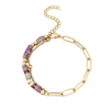Bracelet en acier inoxydable doré pour femme avec chaîne à grands maillons, perles violettes et détails dorés au style élégant et moderne.