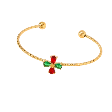 Bracelet jonc doré pour femme avec finition texturée et motif fleur composé de détails rouges et verts, élégant et raffiné.