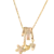 Collier femme en acier inoxydable avec chaîne dorée et pendentifs mobiles décoratifs au style élégant et moderne.