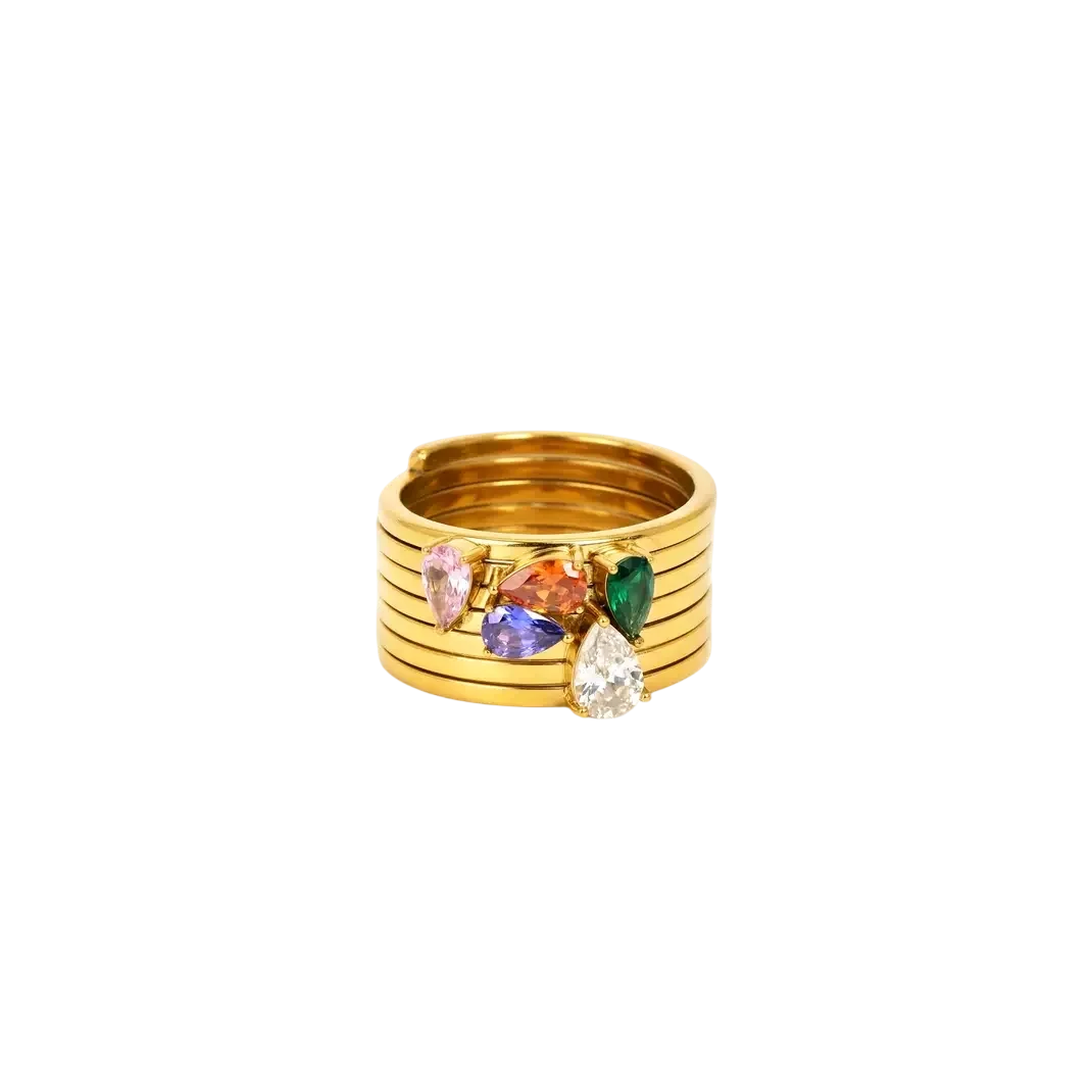 Bague dorée pour femme au design multi-anneaux avec pierre décorative disponible en blanc, vert, rouge, bleu ou rose.