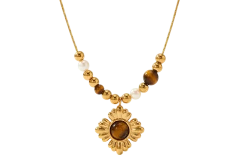 Collier doré pour femme avec pendentif fleur à cabochon brun et perles décoratives blanches et brunes sur la chaîne.