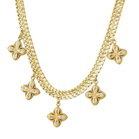 Collier femme doré avec chaîne à mailles plates et cinq pendentifs en forme de fleur ornés de détails scintillants.