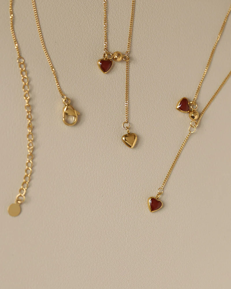 Collier pendentifs cœurs en acier inoxydable doré élégant – Image 3