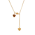 Collier en acier inoxydable doré avec deux pendentifs en forme de cœur, dont un cœur rouge et une chaîne pendante élégante.