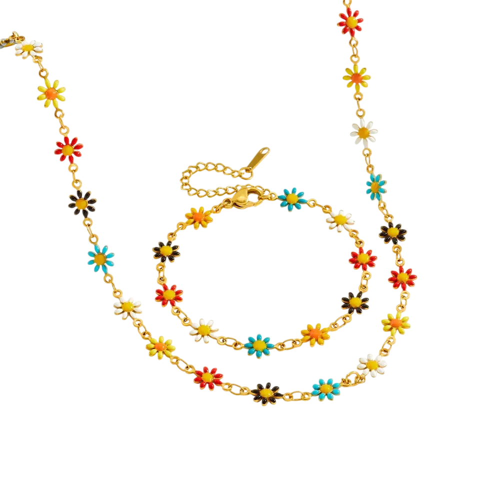 Ensemble de bijoux pour femme avec collier et bracelet dorés décorés de petites fleurs multicolores sur une chaîne fine.